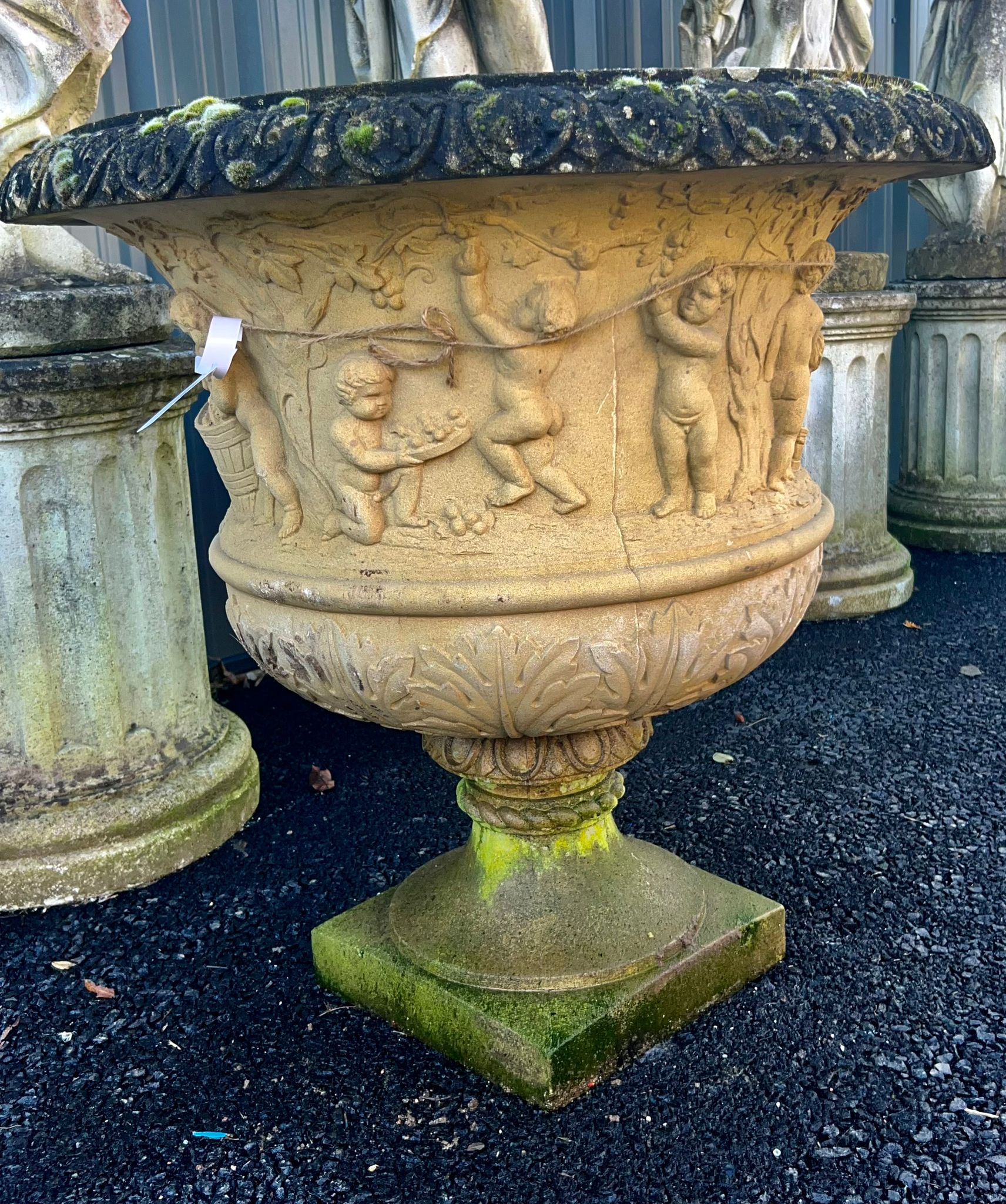 Large Stone Decorative Urn with Children Detail