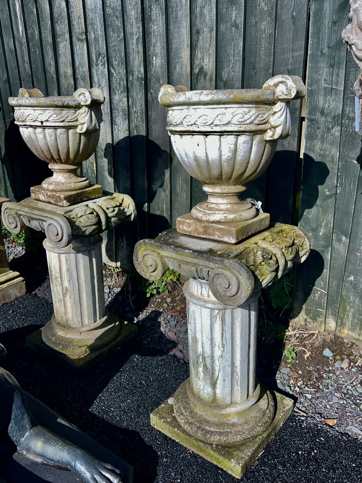 Pair of Victorian Stone Urns on Decorative Plinths (5ft 4)