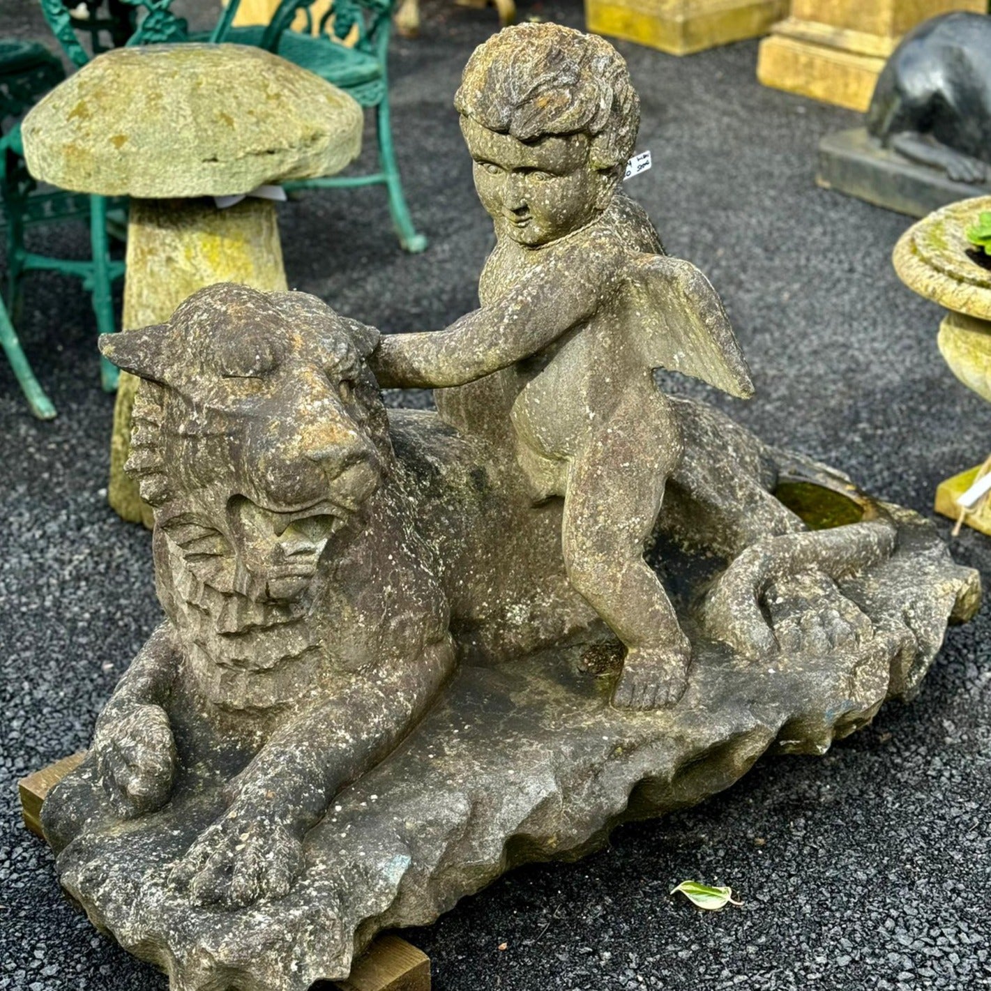 Cupid Taming the Lion (Cast Iron Covered in Stone)