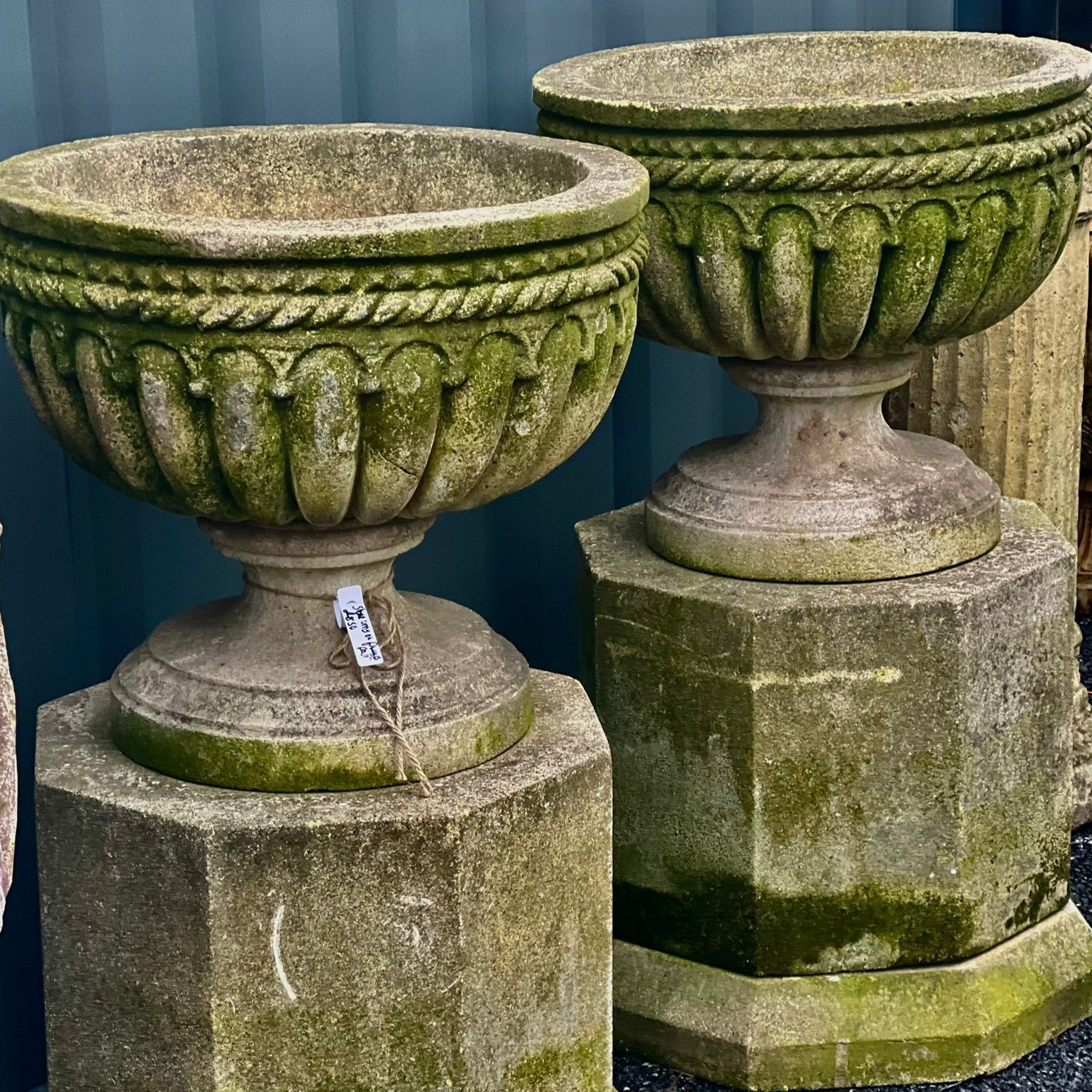 Pair of Large Stone Urns on Plinths - 39 Inches Tall, 22 Inches Wide