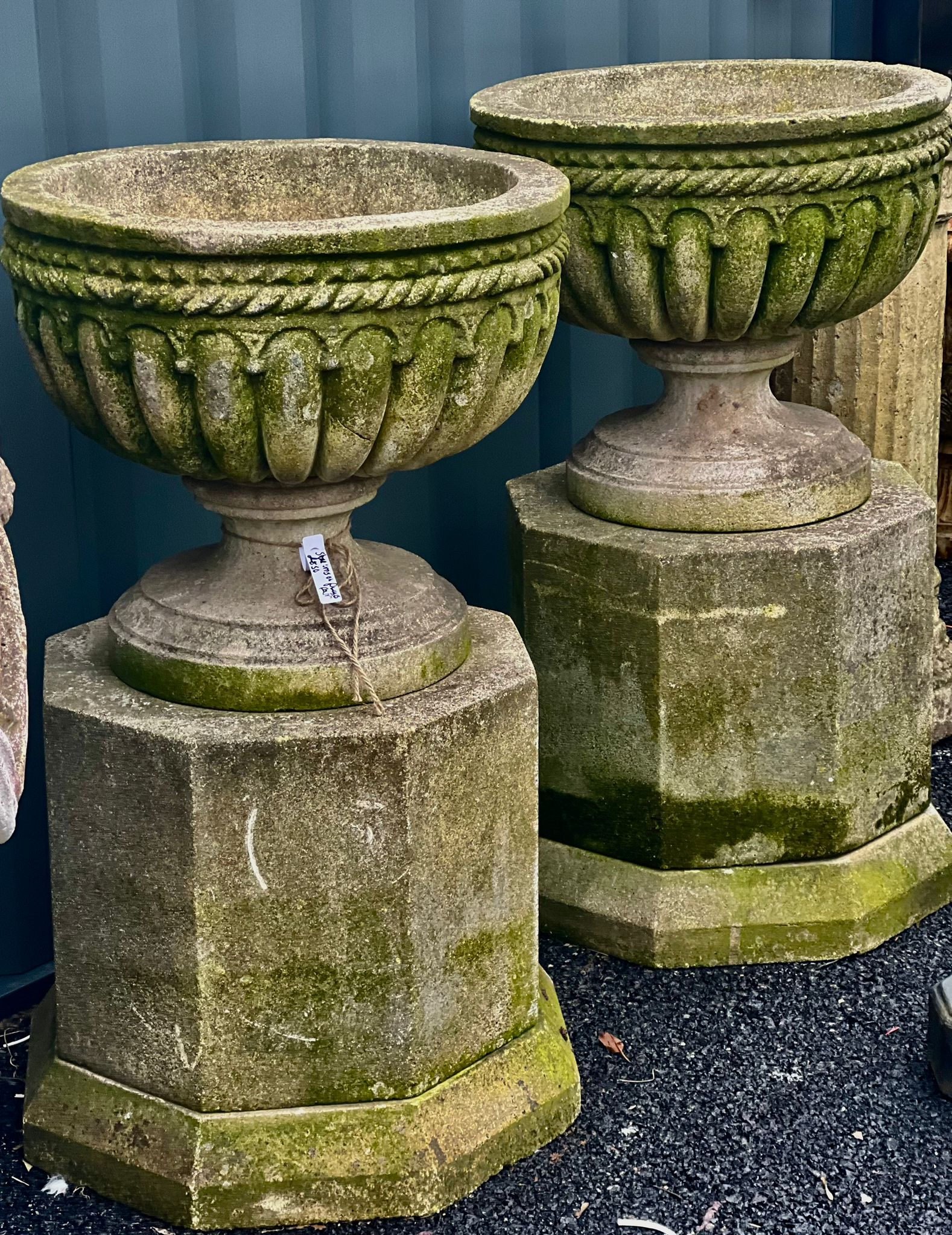 Pair of Large Stone Urns on Plinths - 39 Inches Tall, 22 Inches Wide