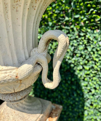 Pair of Cast Iron Urns and Plinths with Snake & Mask Detail